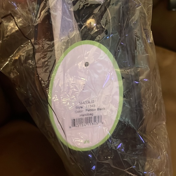 NWT Never been unwrapped. Photo for comparison bag. - Picture 6 of 7